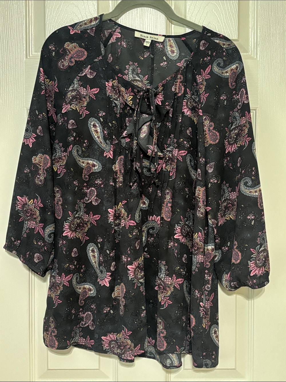 Grey top with pink paisley